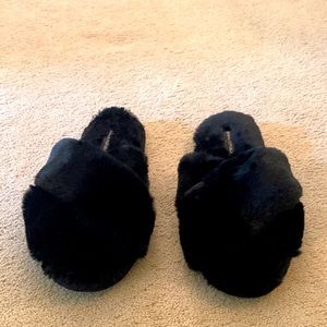 Brand new and never worn Banana Republic slippers. They are way too big for me.